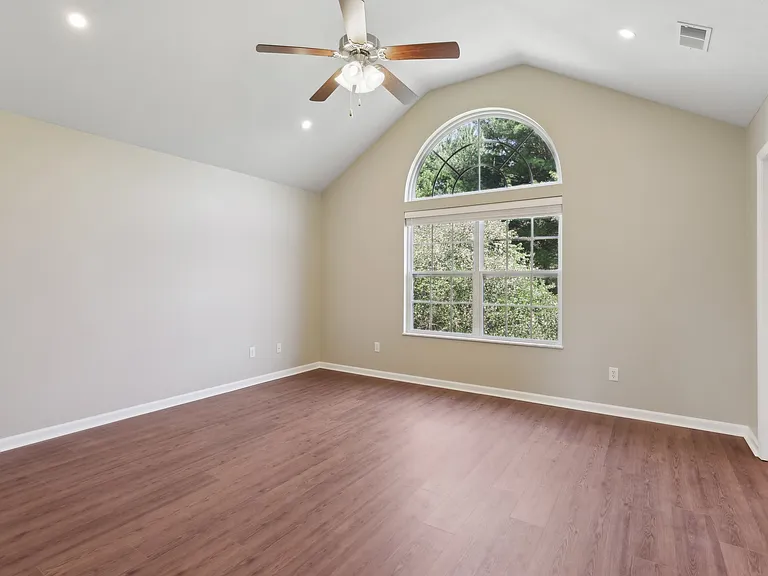 Master Bedroom - Cathedral Ceiling, Ceiling Fan, LED Lighting and LVP Flooring