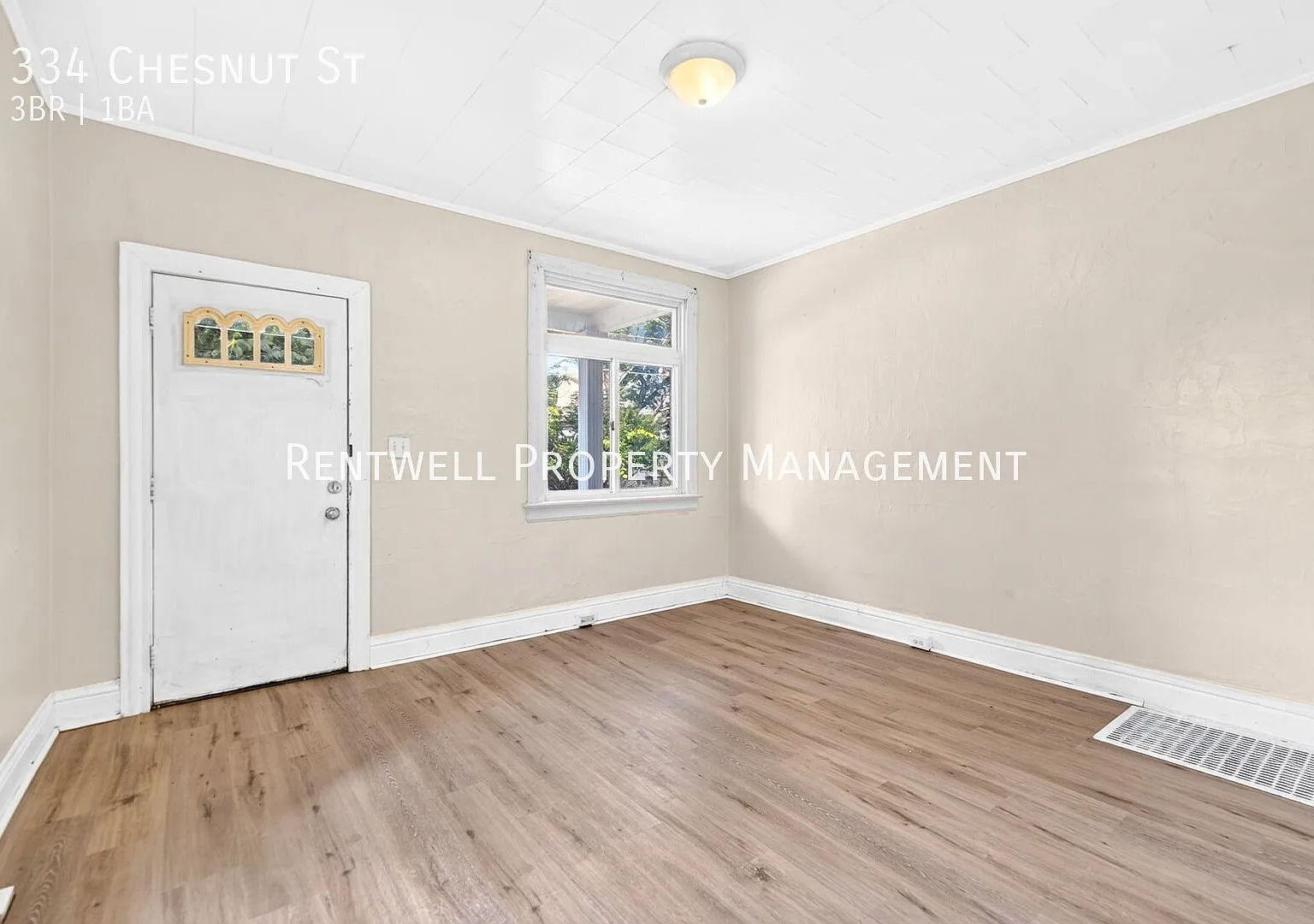 Spacious 3-Bedroom Home with Finished Basement & Wooded Views — Photo 3