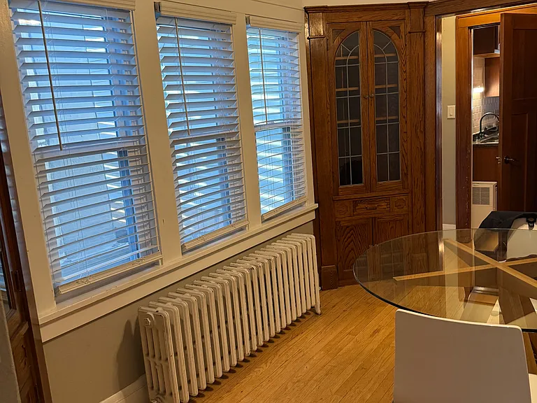 DINING ROOM WITH CUSTOM BUILT IN SHELVING