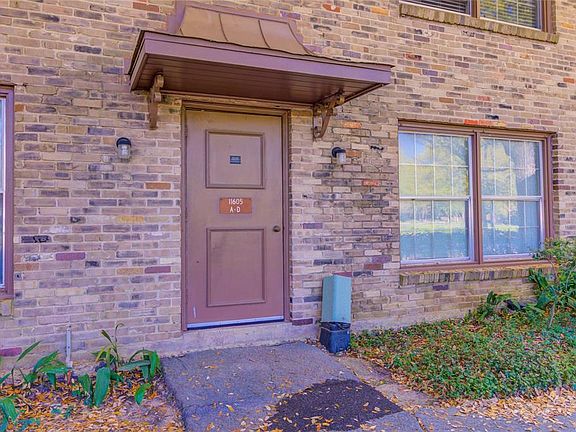 Entryway to the 4 units adjacent to the front parking area. To the rear of the property is covered and assigned parking for residences.