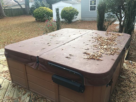 Deck with hot tub off of master bedroom