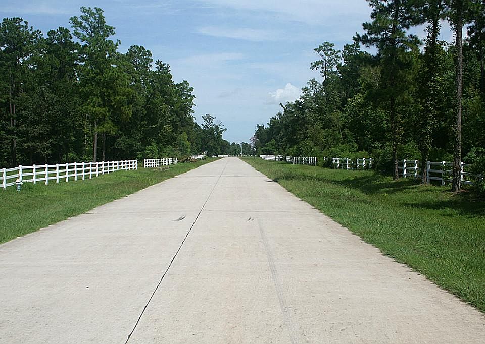 Facing towards the entrance 2100. Property is on your right