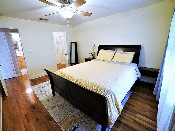 Walk in closet attached to bedroom