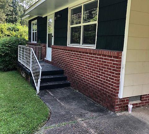 Front stairs. View from driveway.