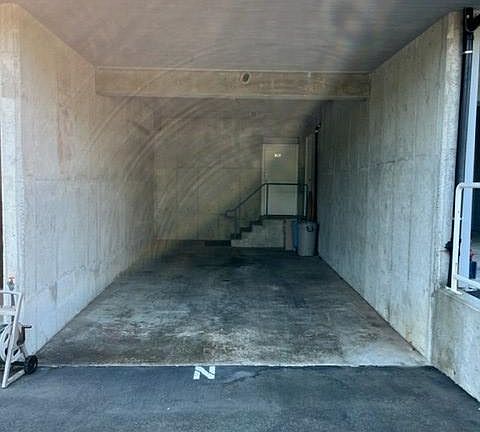 14 x 29 covered carport with 10x10 storage closet below unit