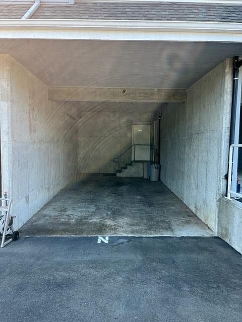 14 x 29 covered carport with 10x10 storage closet below unit