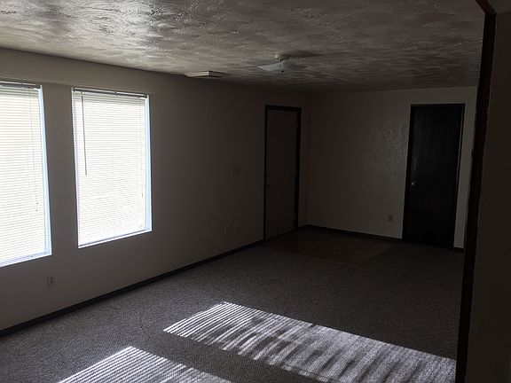 Front entrance, living room and coat closet