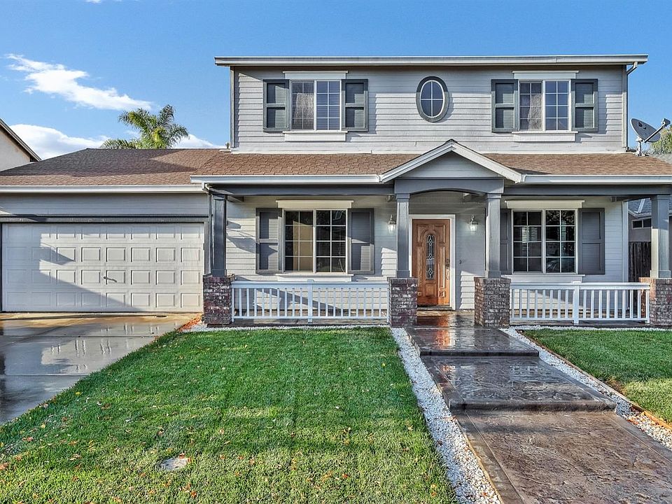 Welcome to this STUNNING 2-story home in Riverbank with 3 car TANDEM garage!