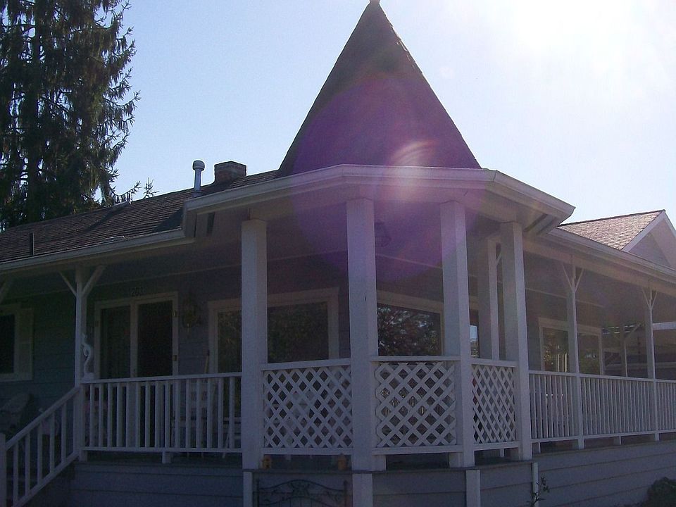 Inviting wrap-around porch