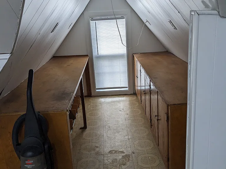 Third floor, office/playroom with a convenient half bathroom