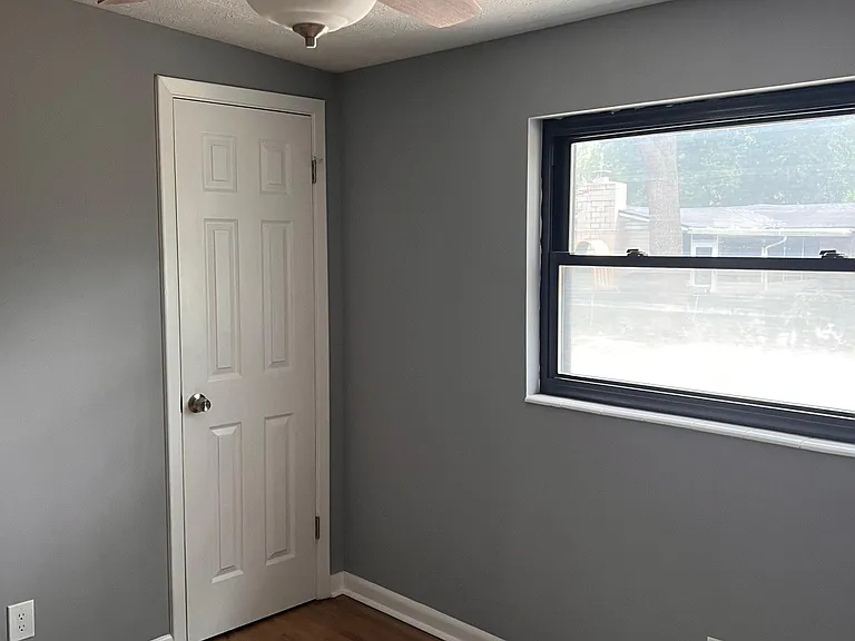 Master bedroom showing on suite bathroom door.