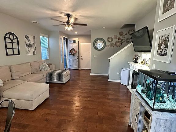 Living Room viewed from the backyard/dining room/kitchen area