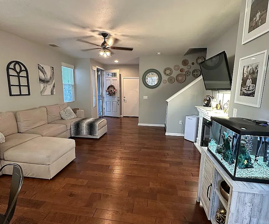 Living Room viewed from the backyard/dining room/kitchen area