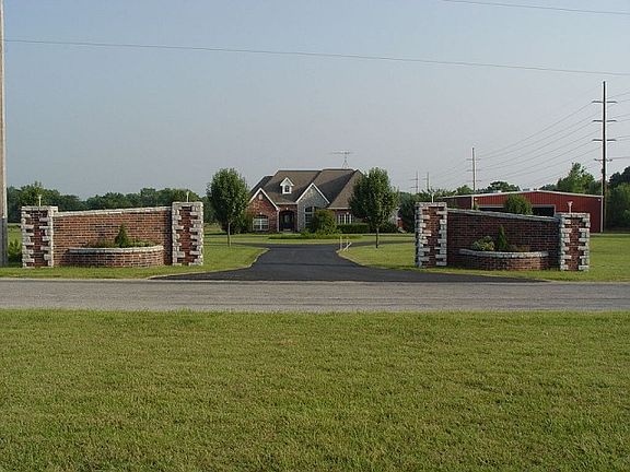 Stunning entrance with brick walls