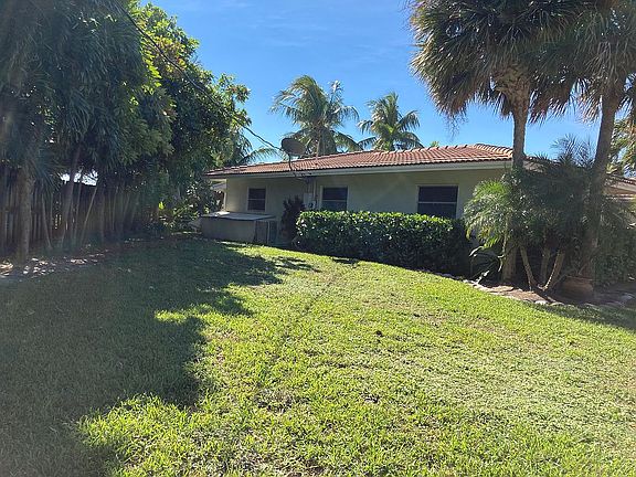 Side yard with room to add!
