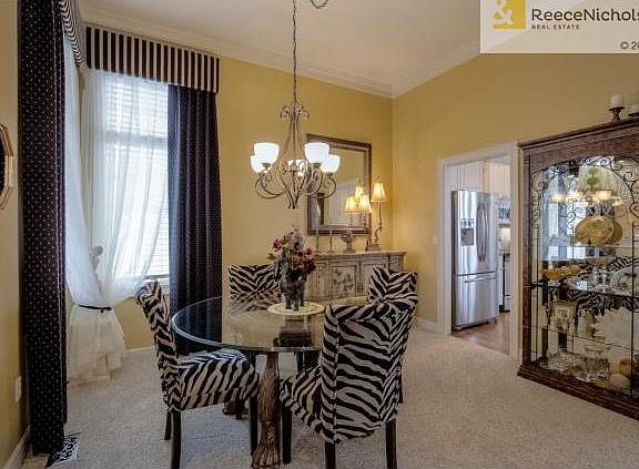 Dining area opens to the custom kitchen