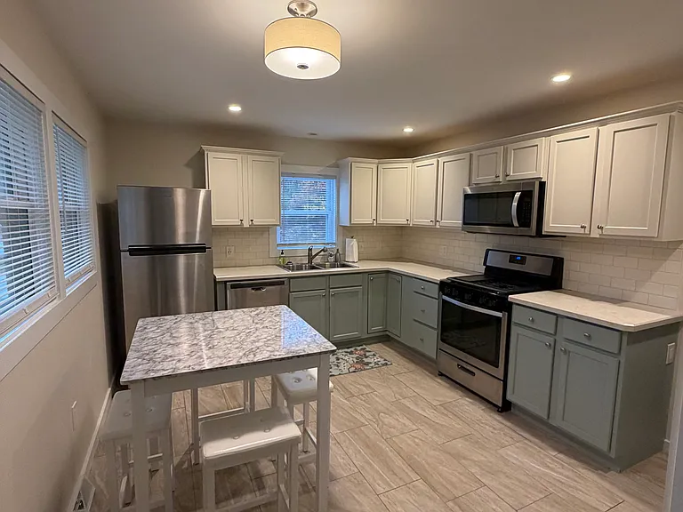 Fully stocked kitchen with gas stove