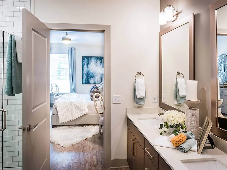 Walk-in showers with subway tile surrounds in select homes