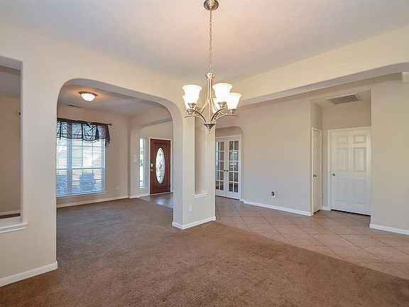 The formal dining room will accommodate your larger seating and with the formal living room this space is perfect for entertaining.