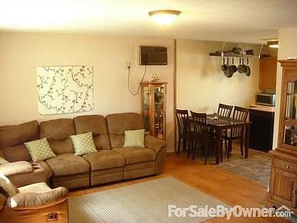 Front side of house
						:
						Newly trimmed trees, lots of sun and shade now.