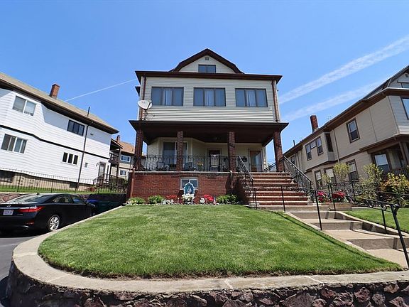 Front of the house. The room is located on the second floor.