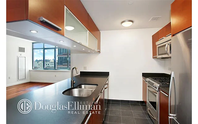 Rented by Douglas Elliman | media 50