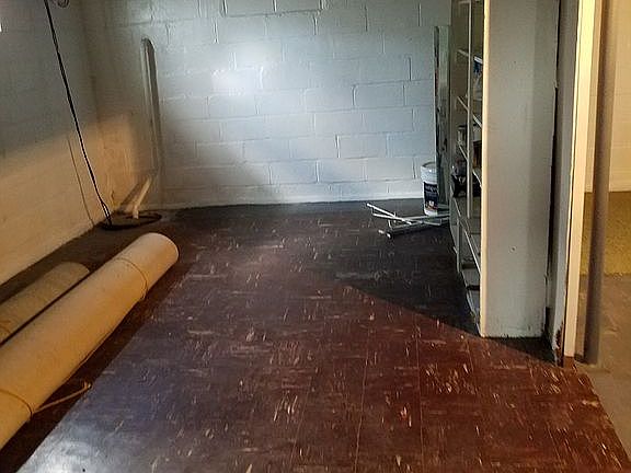 One of 3 rooms in basement