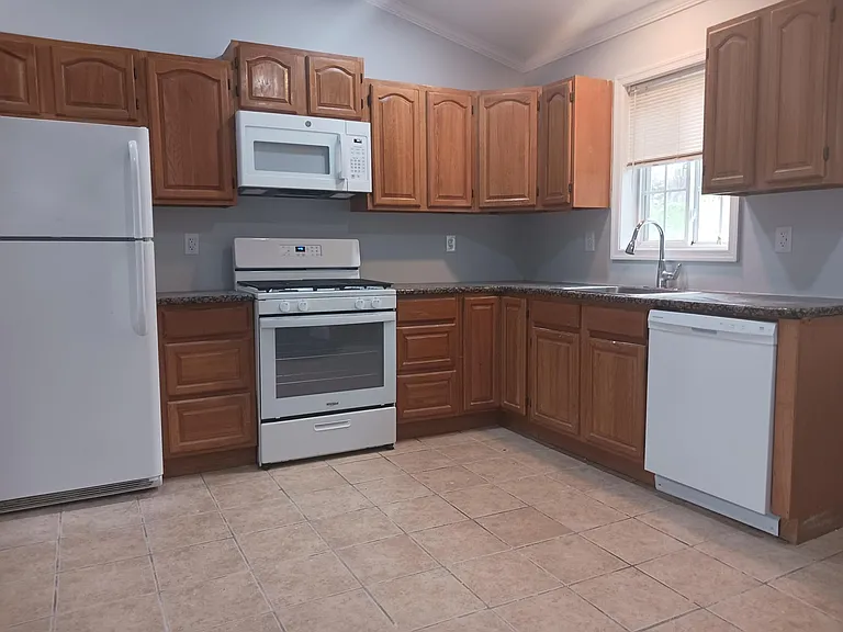 Kitchen with white appliances