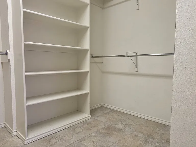 RIGHT SIDE OF MASTER CLOSET