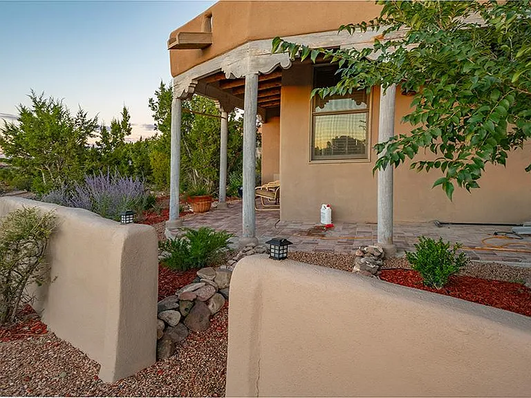 Wraparound portale of master bedroom. Sunset views of Jemez Mountains.