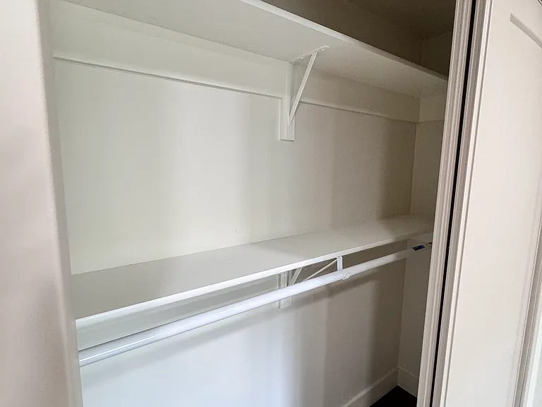 Comfortable third bedroom ideal for guests, kids, or a home office.