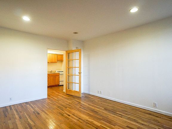 3rd image of 157 E 3rd St APT 1C