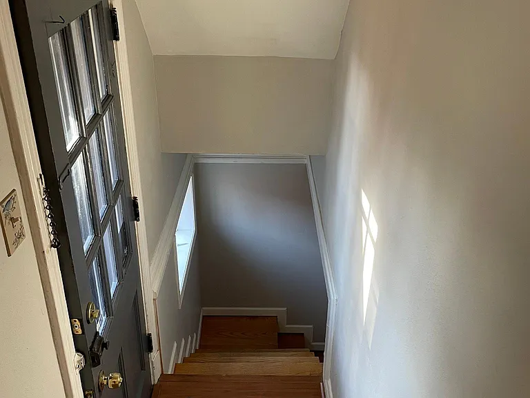 View from the kitchen leading into the finished basement.