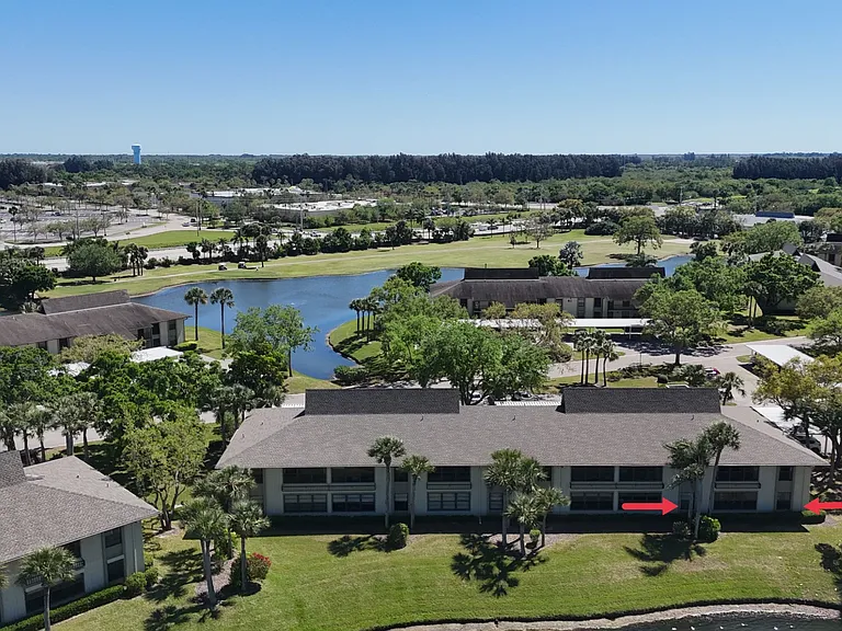 1st floor, END UNIT w/ spectacular lake & golf course views!