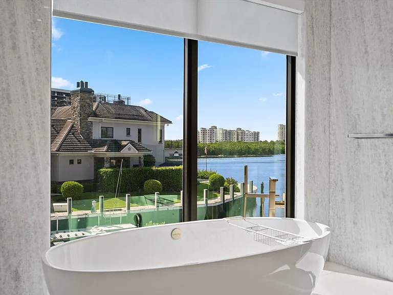7474 NE Bay Cove Ct — Photo 85