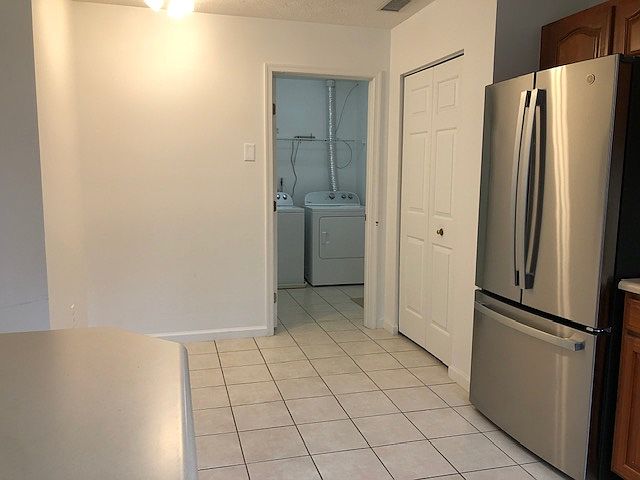 Laundry Room off of Kitchen and Garage. Large Pantry. Eat in kitchen. Refridgerator w/matching Stove Top, Microwave and Dishwasher.