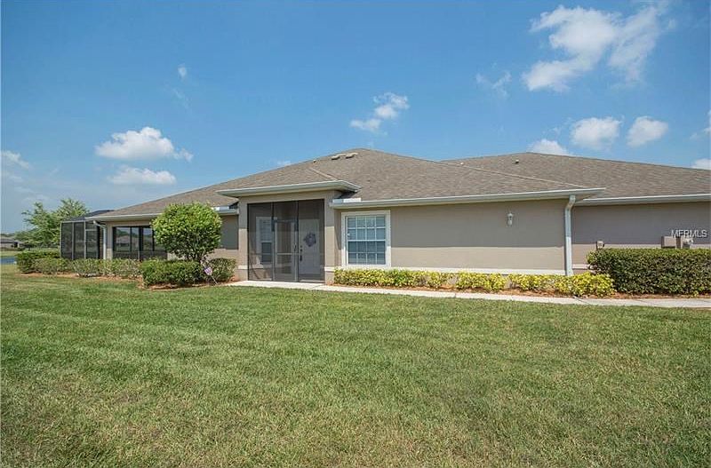 Screened entrance with large private side yard!