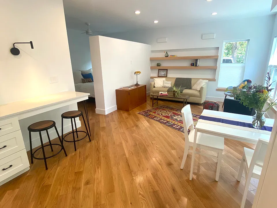TABLE AND 2 CHAIRS FOR WORK AND DINING PLUS SEPARATE DESK AREA WITH STOOLS