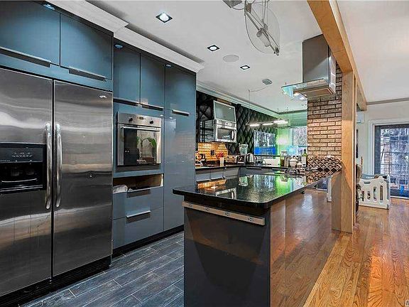 3rd image of 54-36 72nd St #1