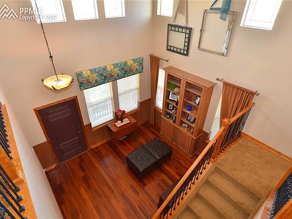 VIEW OF THE ENTRANCE FROM UPSTAIRS