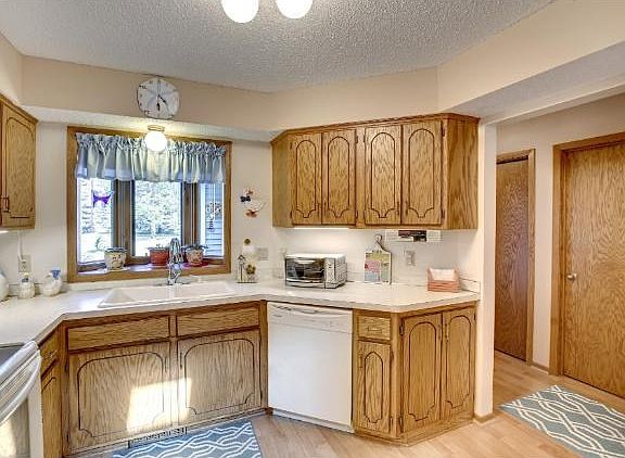 Garden window makes working at the sink an easy task