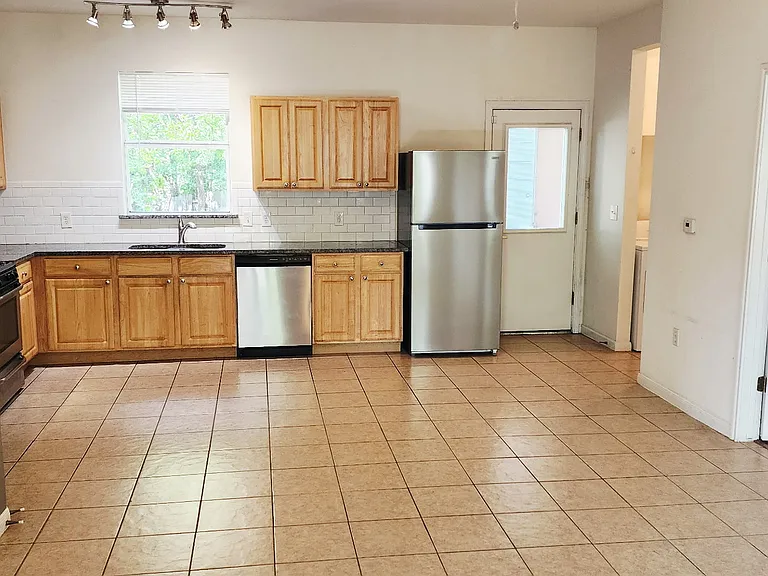 Combo living/dining/kitchen area gives great living flexibility