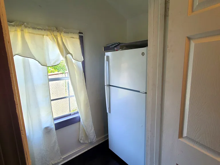 Scullery/Utility Room - Regrigerator and Freezer