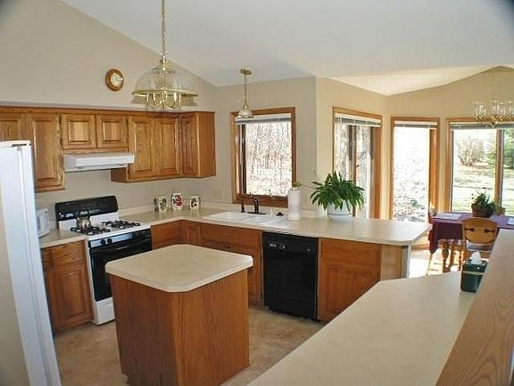 Open concept kitchen with new flooring