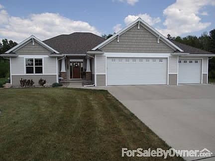 2772 Harbor Cove Lane
						:
						Two tone siding with shaker shingle.