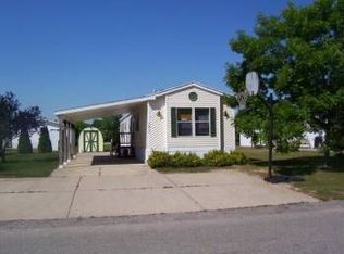 7417 Woods Edge Dr NE, Belmont, MI 49306