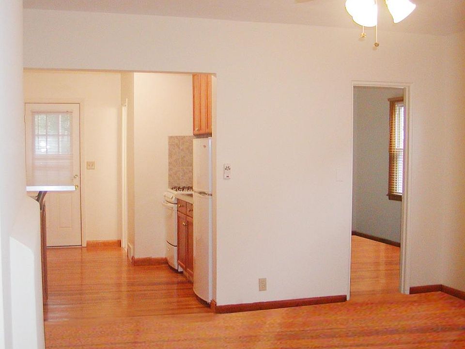living room looking into kitchen and office