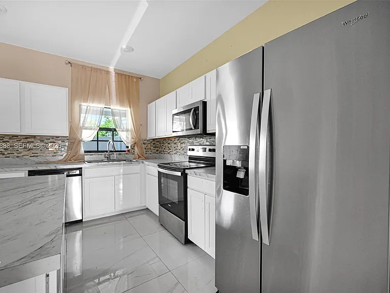 1130 SW 6th Ct — Photo 56