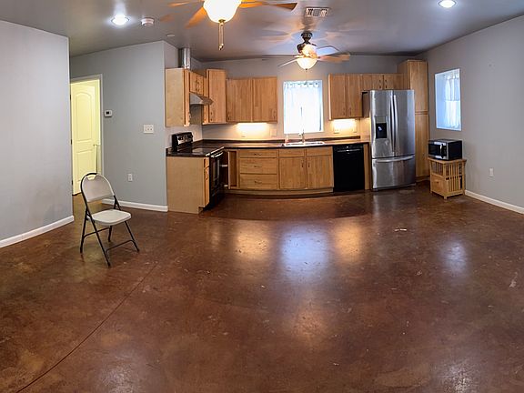 Panoramic View while standing in door to garage. Furniture not included.