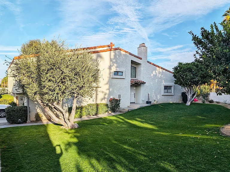 Townhouse with only one shared wall and private entrance.